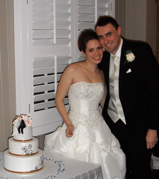 Chris and Sarah with Wedding Cake